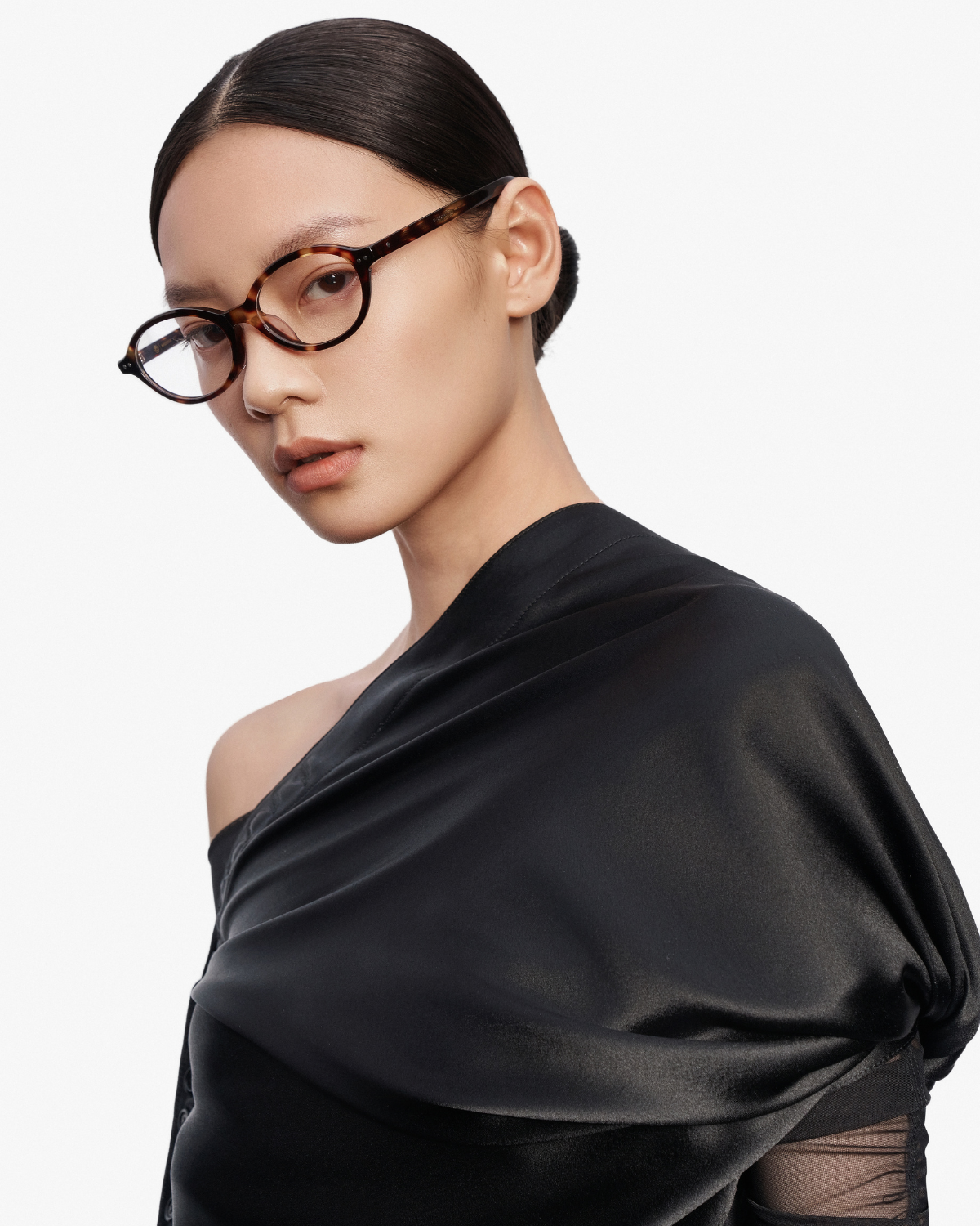 Model wearing MUJOSH optical frames
