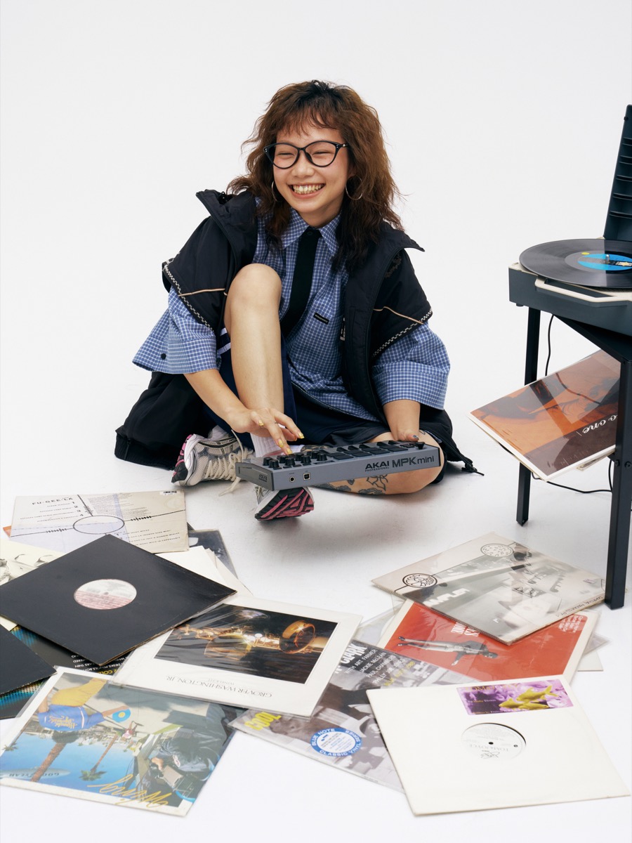 Female model wearing MUJOSH eyewear in an official campaign image